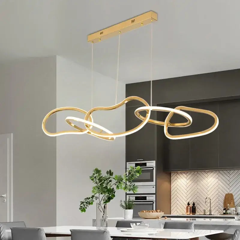 Modern gold led ring chandelier dining room pendant light with interconnected circular rings and sleek rectangular mount