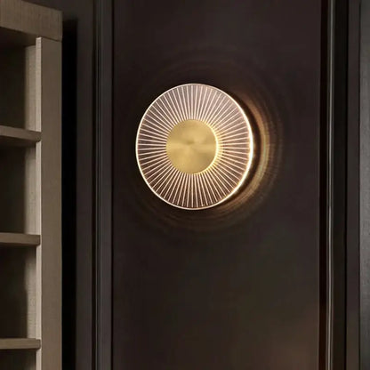 Modern gold led round wall lamp decorbites gold led round sconce with warm golden finish and soft ambient light