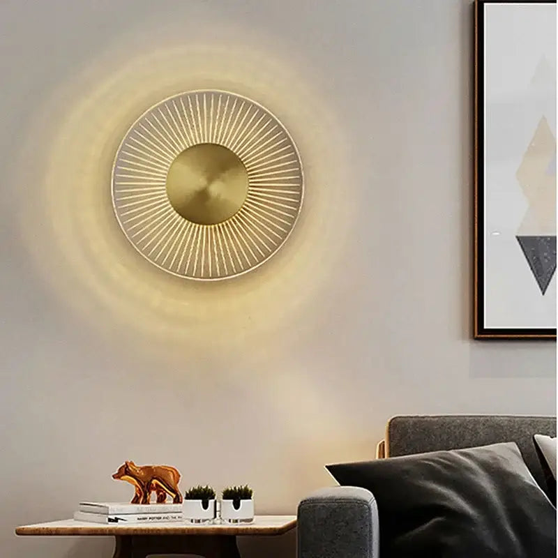 Modern gold led round wall lamp decorbites gold led sconce with sunburst design and warm ambient lighting