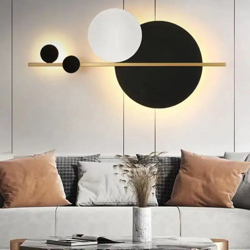 Modern gold led wall lamp with sleek bar and three black and white circular shades for bedroom decorbites led wall sconce