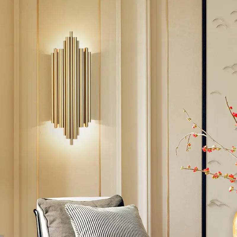 Modern gold led wall lamp featuring brass rods in a symmetrical sunburst pattern for elegant living room decorbites wall lamp