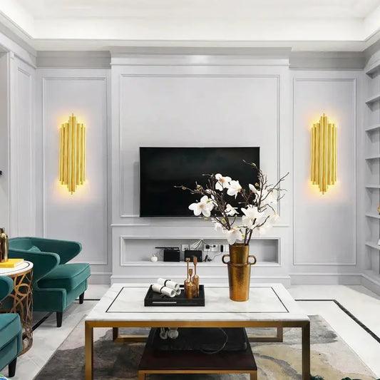 Modern gold led wall lamp with gold textured vase holding white orchids for living room decorbites gold led decor