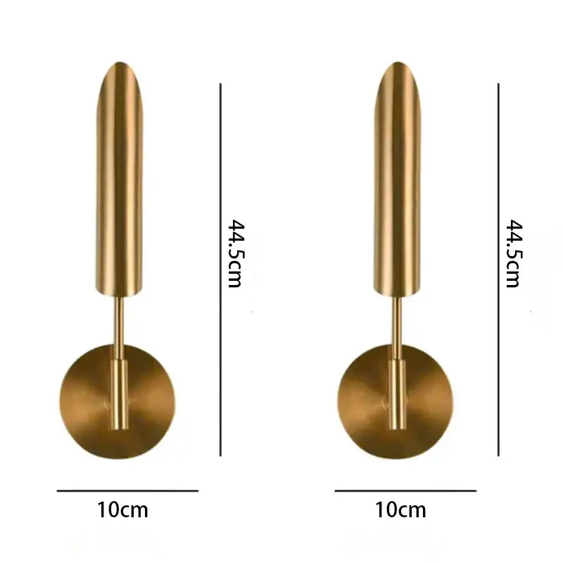 Brass-finished modern led wall lamp with sleek cylindrical design and spherical bulb for living room use
