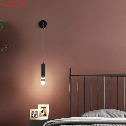 Modern gold led wall lamps featuring a black cylindrical pendant with warm led illumination for stylish decorbites led wall lighting