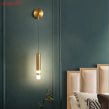 Modern gold led wall lamps featuring a cylindrical pendant with frosted glass diffuser for bedroom decorbites led wall lighting