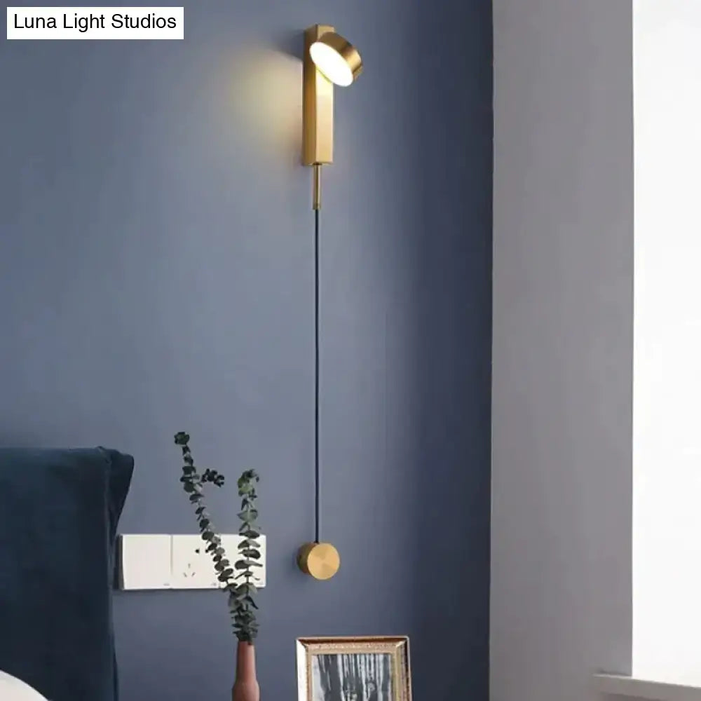 Modern gold led wall lamps featuring a sleek gold-toned adjustable head and circular base for bedroom lighting