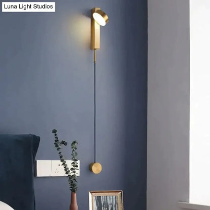 Modern gold led wall lamps with a sleek adjustable head and long black cord for bedroom wall lamps lighting