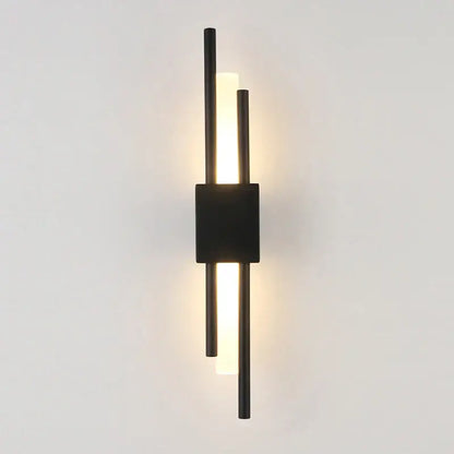Modern black metal wall sconce with three vertical rods and central illuminated panel for decorbites led wall ambient lighting