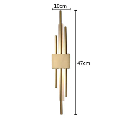 Modern gold led wall sconce with slender vertical rods and central rectangular diffuser for bedroom ambient lighting decorbites led wall