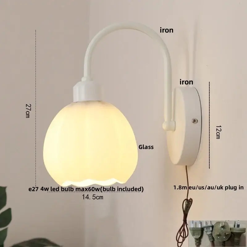 Modern gold led wall sconce with frosted white glass and curved iron arm for stairway lighting wall sconce