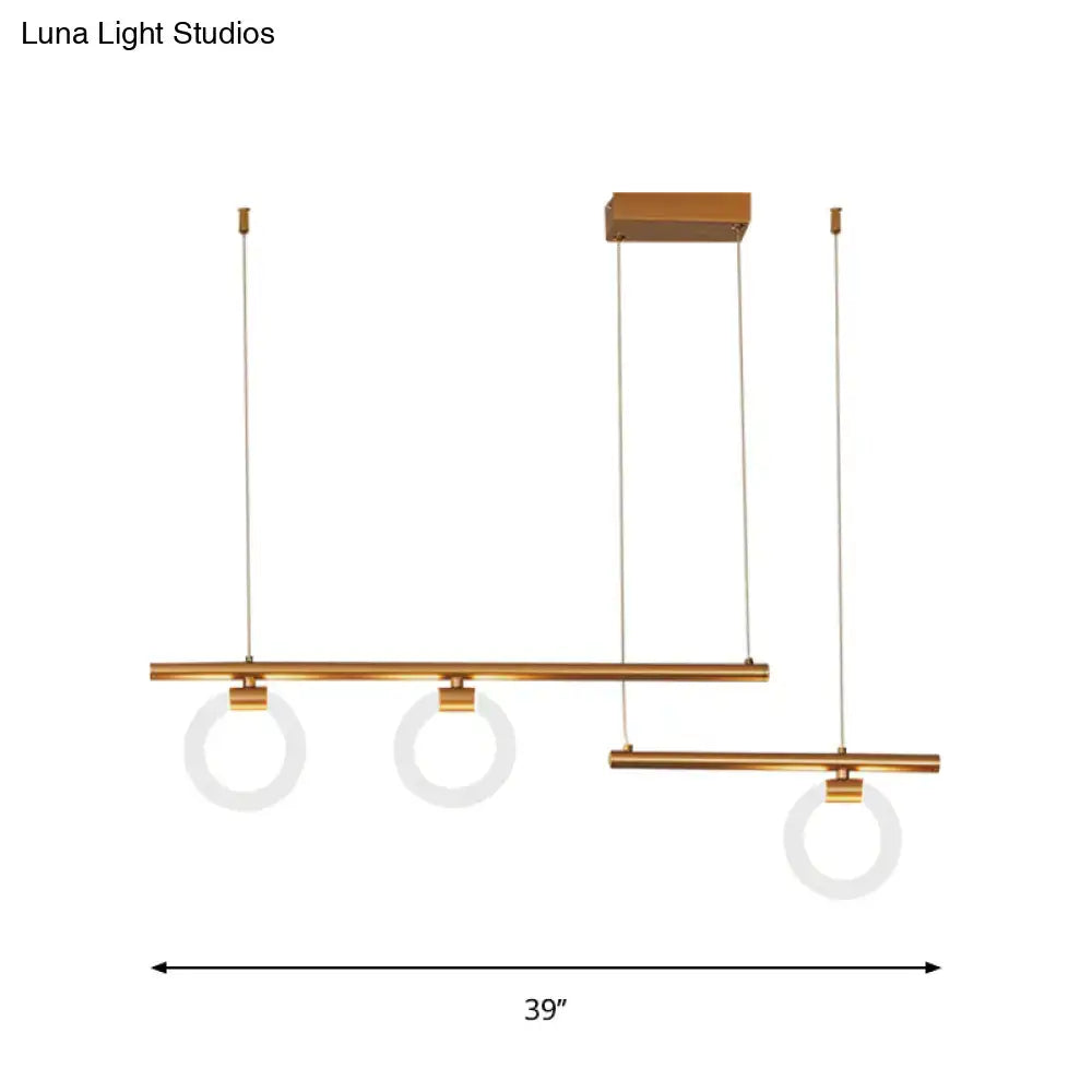 Decorbites modern linear chandelier lamp with brass finish, sleek horizontal bars, and circular glass shades in gold