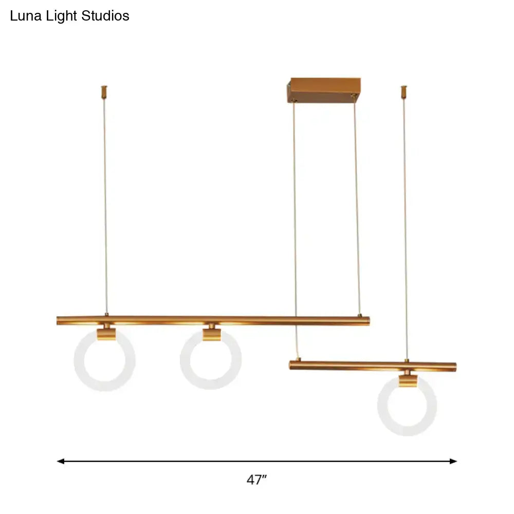 Decorbites modern linear chandelier lamp with brass finish and three frosted glass shades suspended by cables