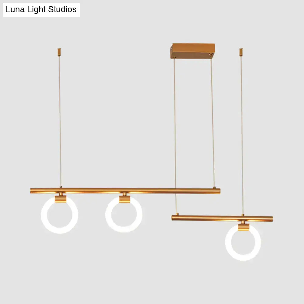 DecorBites™ modern metal chandelier lamp with gold-toned linear bars and glowing circular LED rings in warm white light