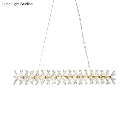 Modern gold linear crystal island lamp with clear prisms and metal accents for living room fixture width display