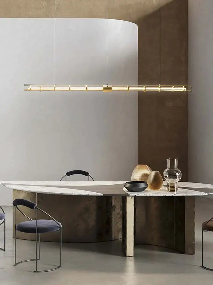 Modern gold linear glass chandelier dining room pendant light with gold metal frame and cylindrical led bulbs by decorbites glass chandelier