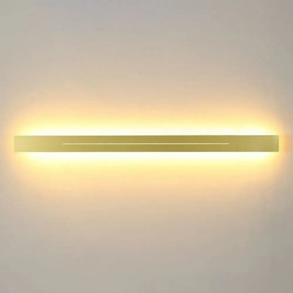 Modern gold linear led wall light fixture with sleek rectangular design and warm ambient glow for living room use