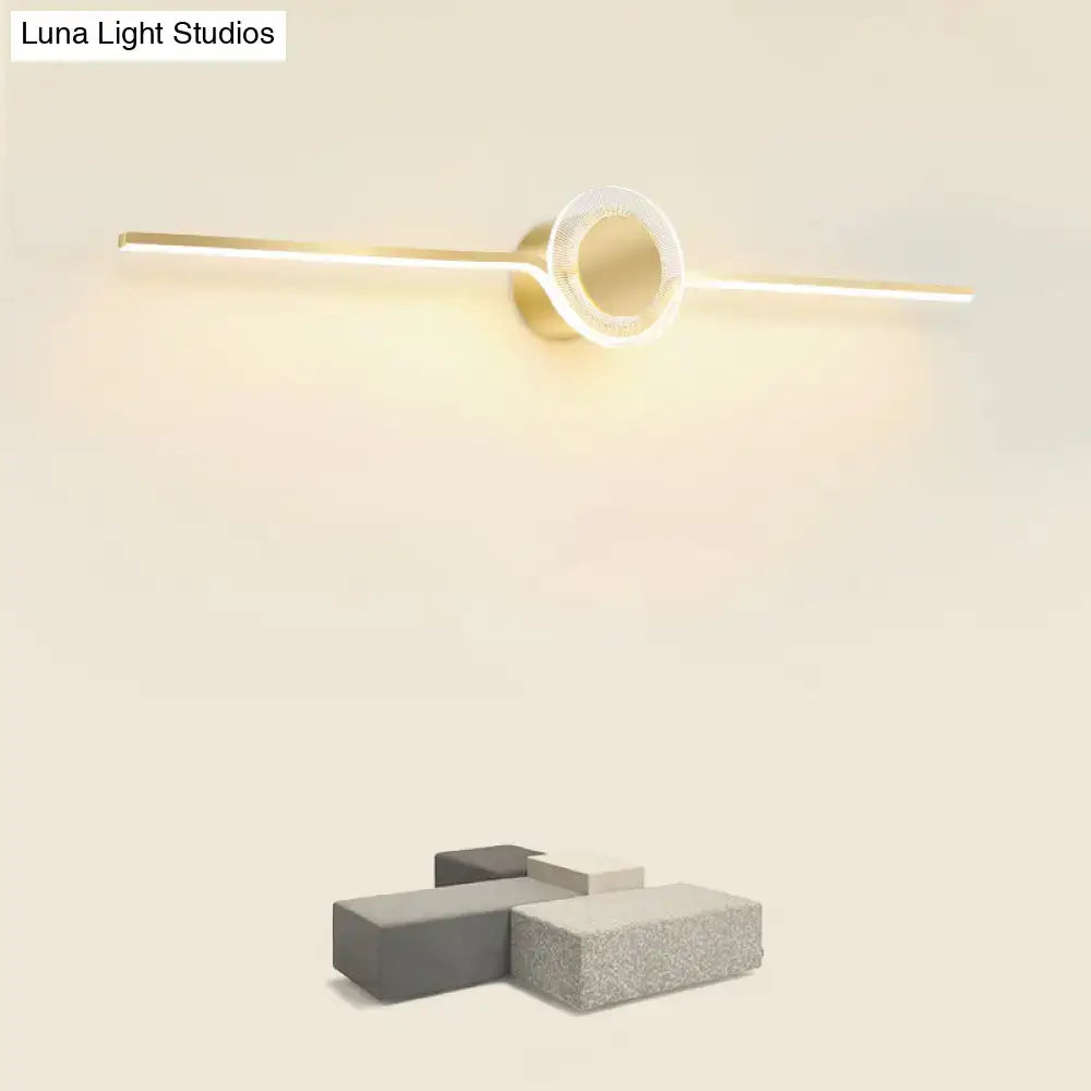 Modern gold linear led wall sconce with sleek design and circular accent featuring maximum bulb wattage for bathroom light