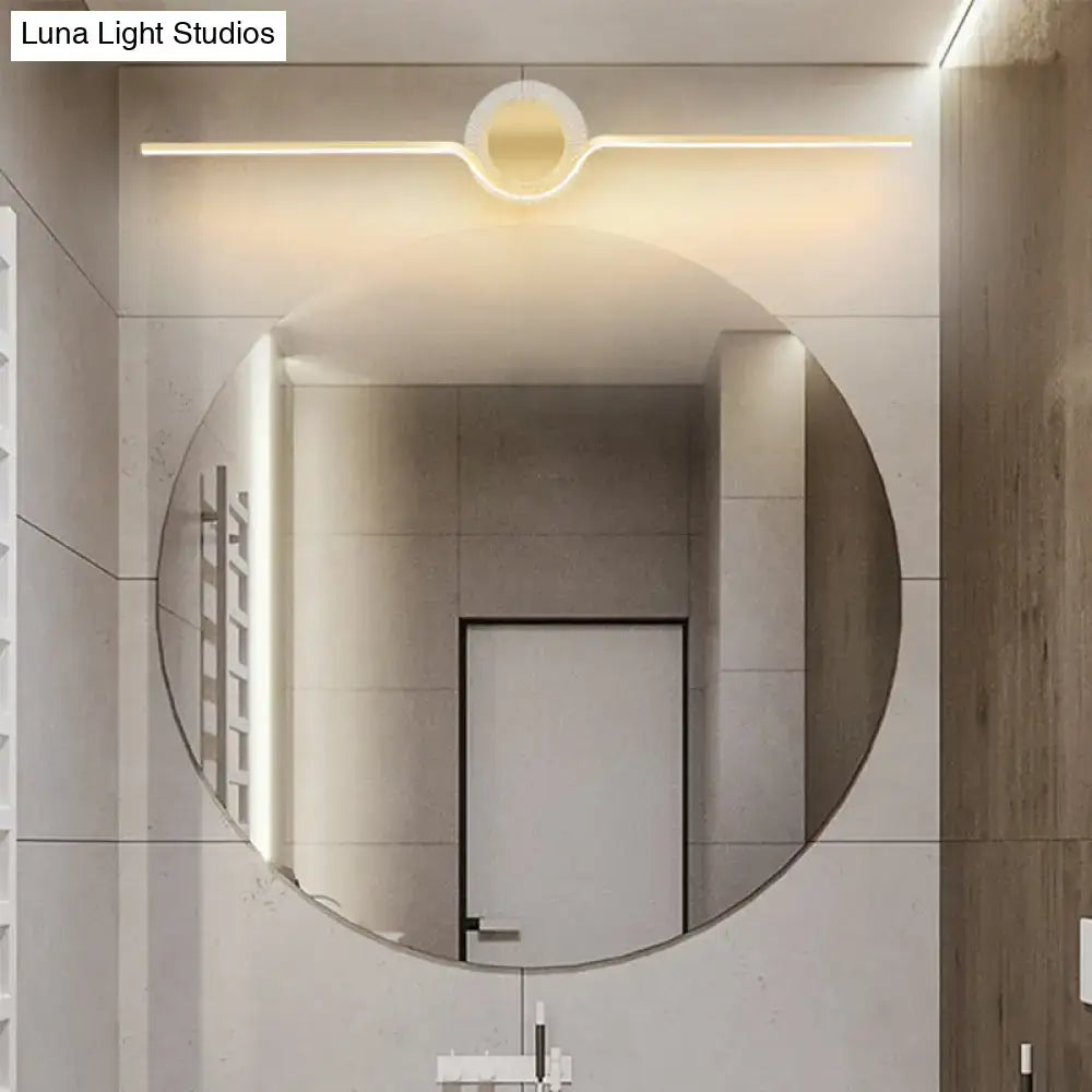 Modern gold linear LED wall sconce with maximum bulb wattage, featuring circular mirror and integrated warm LED lighting