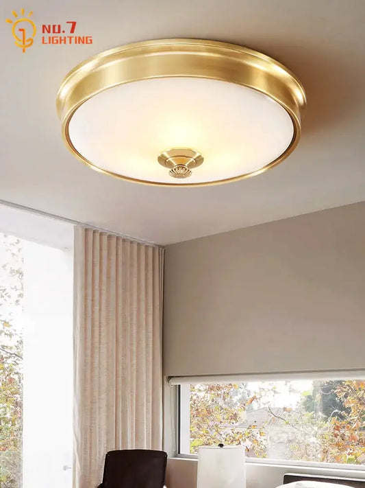 Modern gold lustre copper ceiling lamp with frosted glass diffuser and central decorative element for living room