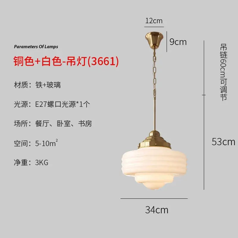 A brass-finished decorbites gold lustre pendant light with tiered frosted glass shade for modern kitchen decor