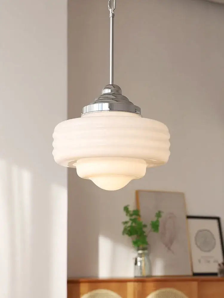 Modern gold lustre pendant light with a tiered frosted glass shade and chrome hardware for kitchen decorbites gold lustre