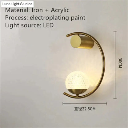 Modern gold luxury creative led bedside wall lamp with c-shaped sconce and frosted acrylic globe light source