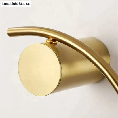 Modern gold luxury creative led bedside wall lamp with sleek curved arm and cylindrical base for bedroom sconce lighting