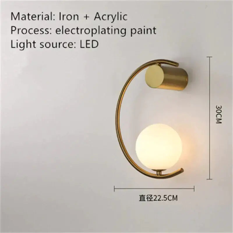 Modern gold luxury creative led bedside wall lamp with curved iron frame and frosted acrylic globe sconce