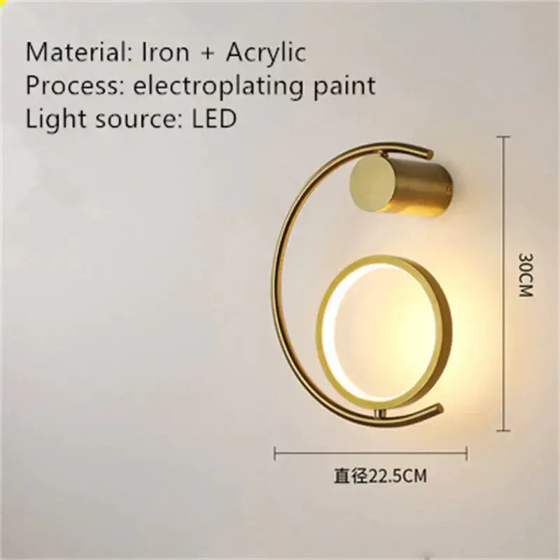 Gold-toned c-shaped luxury creative led bedside wall sconce with circular led light fixture for bedroom use