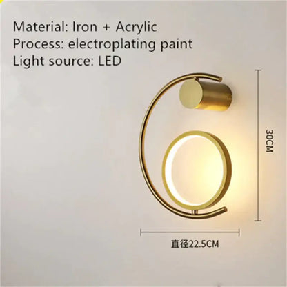 Gold-toned c-shaped luxury creative led bedside wall sconce with circular led light fixture for bedroom use