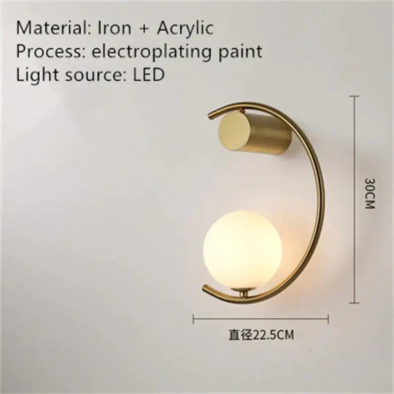 Modern gold luxury creative led bedside wall sconce with curved iron frame and acrylic globe shade for bedroom use