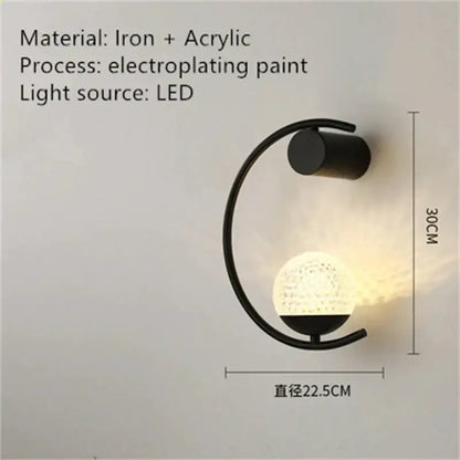 Modern black iron and acrylic luxury creative led bedside wall sconce with curved arm and textured illuminated globe
