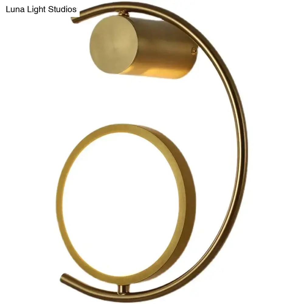 Modern gold luxury creative led bedside wall lamp with a curved minimalist design and illuminated circular ring fixture
