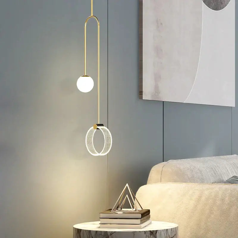 Modern gold luxury led pendant light with spherical bulb and illuminated circular ring for bedroom decorbites gold luxury