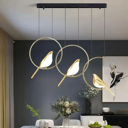 Modern gold magpie bird led ring chandelier with bird-shaped pendant lights and circular wire frames for dining room decorbites gold magpie