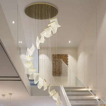 Modern gold mesh duplex building chandelier with cascading translucent white fabric shades and gold-toned accents