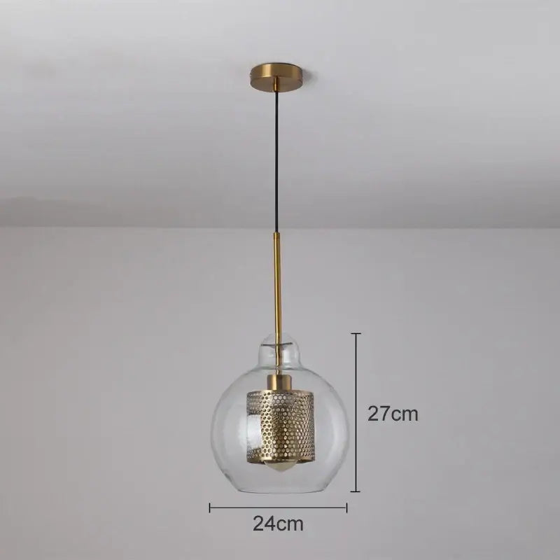 Modern gold mesh glass pendant light with clear globe and gold-toned metal accents for stylish kitchen decorbites pendant light