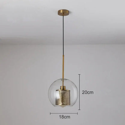 Modern gold mesh glass pendant light with clear glass globe, brass rod, and intricate honeycomb decorbites gold mesh shade