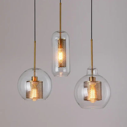 Three modern pendant lights with clear glass and gold mesh glass honeycomb interiors for kitchen decorbites gold mesh fixture