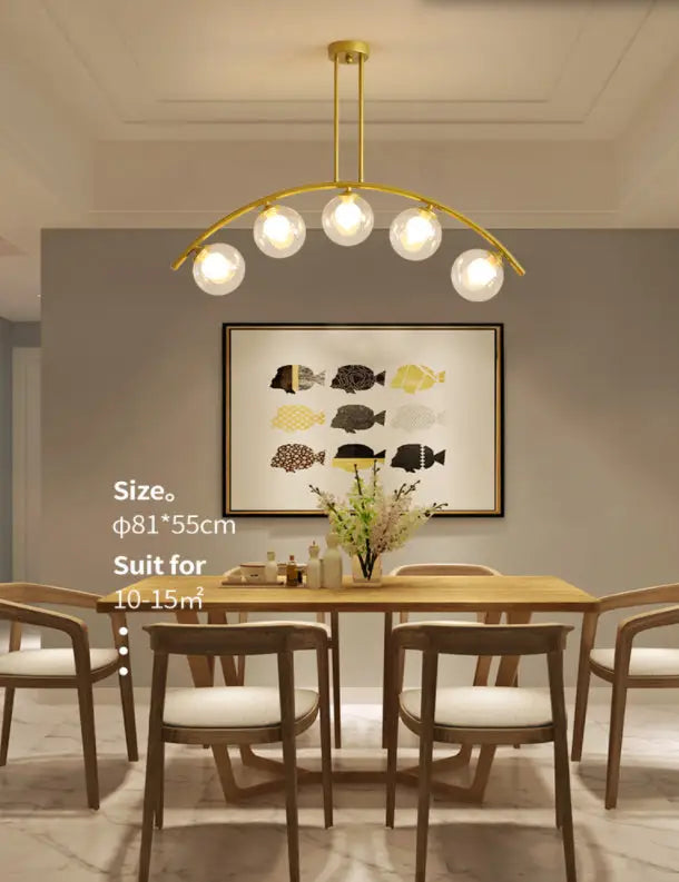Modern gold metal arched ceiling light with five spherical glass bulbs for dining room illumination
