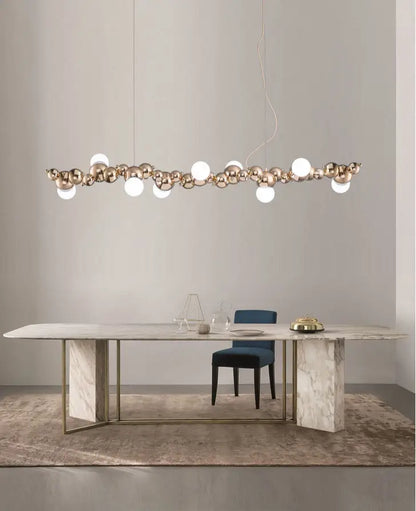 Modern gold metal arched ceiling light with 6 spherical bulbs for dining room featuring alternating gold and white finishes
