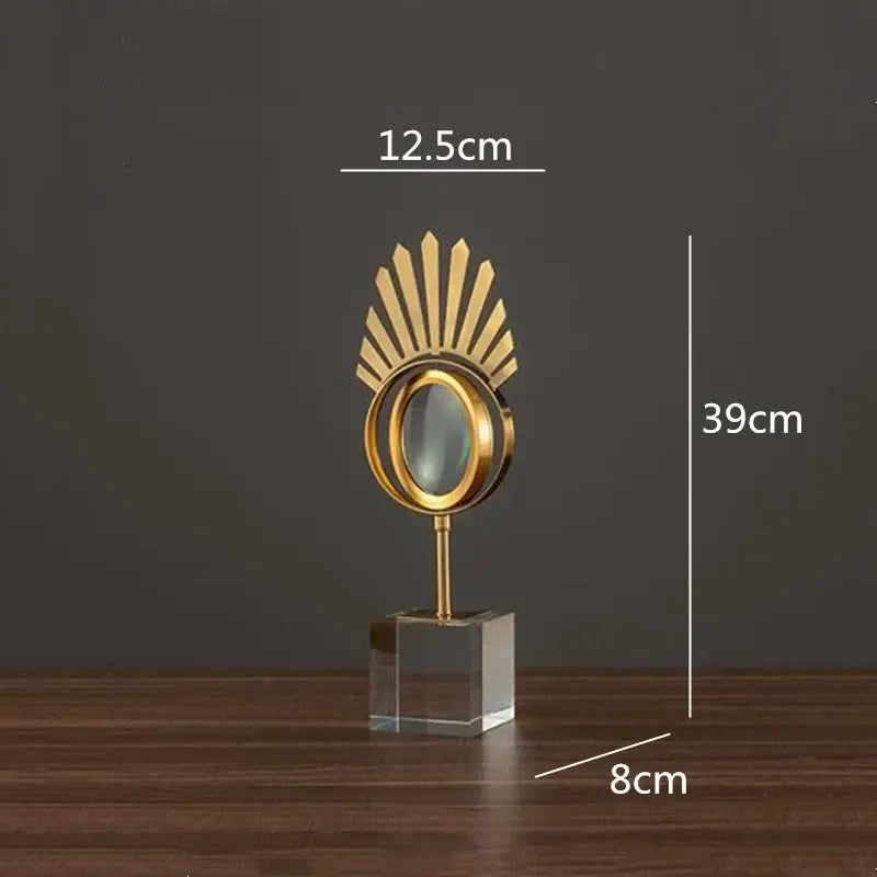 Modern gold metal magnifying glass with golden sunburst design and clear crystal glass base decorbites golden metal decor