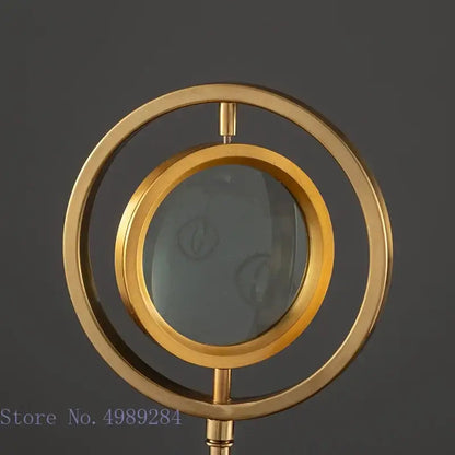 Modern gold metal magnifying glass with glass base featuring elegant decorbites golden metal design for living room decor