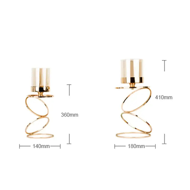 Modern gold metal frame glass candle holder featuring gold-toned spiral metal holders with clear glass tops decorbites gold metal decor