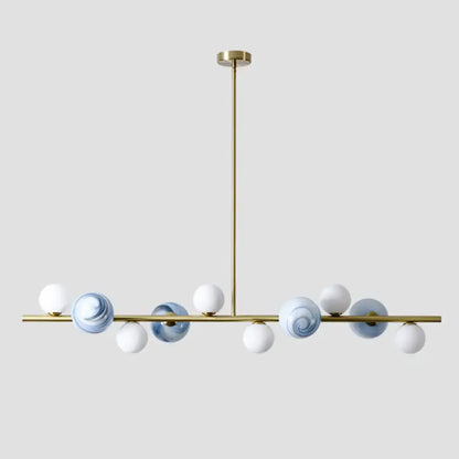 Modern gold metal glass globe chandelier with white and blue marbled lights and adjustable chain cord length for dining table