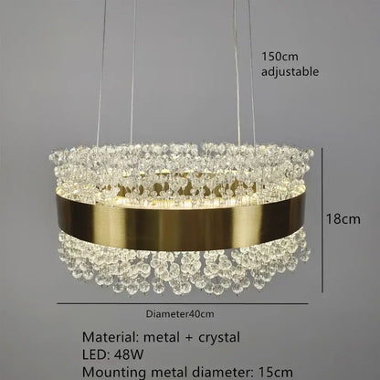 Elegant modern gold metal led chandelier with cascading crystal droplets and sleek metallic band for dining room decorbites gold metal