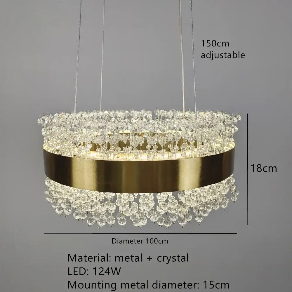 Modern gold metal led chandelier with gold-toned circular frame and cascading clear crystal droplets for dining room decorbites gold metal