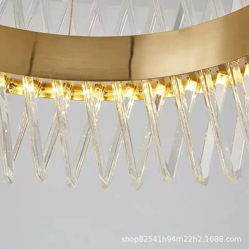 Modern gold metal pendant lamp with sleek s shape led design and cascading crystal prisms for luxury living room decorbites