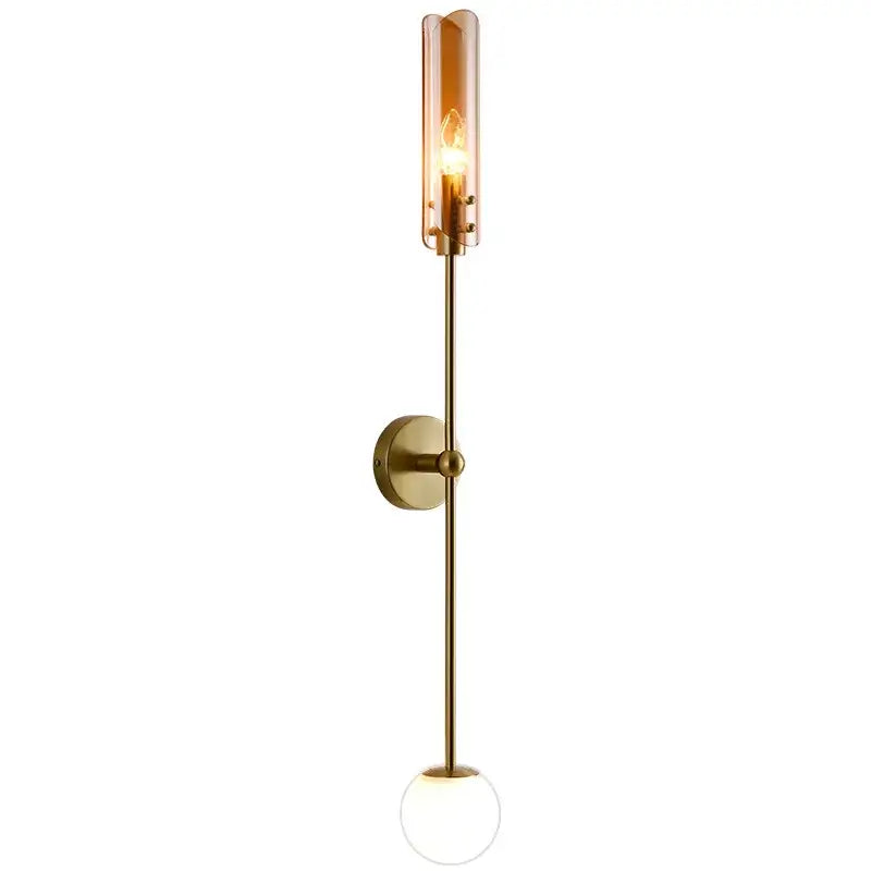 Modern gold metal wall light brass-finished sconce with warm amber glass shade and frosted globe for bedroom decorbites gold metal