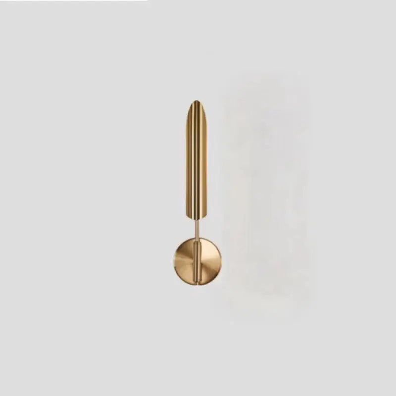 Modern gold metal wall sconce with polished brass finish and frosted globe for elegant bedroom decorbites gold metal lighting